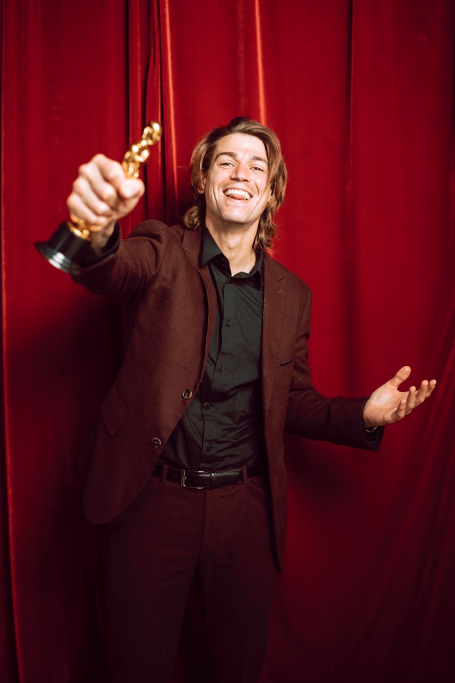 Invitations winner with trophy