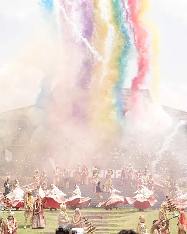 Colour smoke over the Jaipur-themed wedding parade